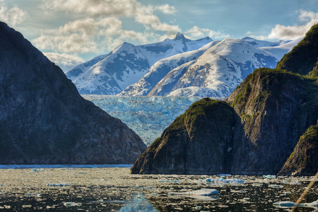 photography of mountain near body of water, Tracy Arm Fjord and Sawyer Glacier.