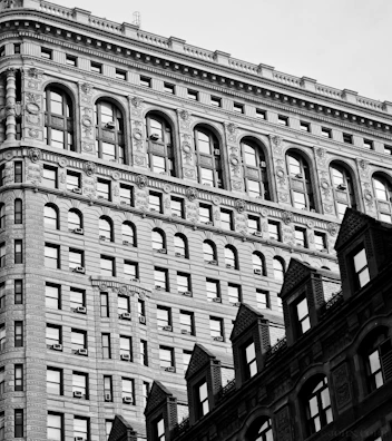 An elegant black and white photograph of the Coin Harvey House facade shortly after its completion in 1874.
