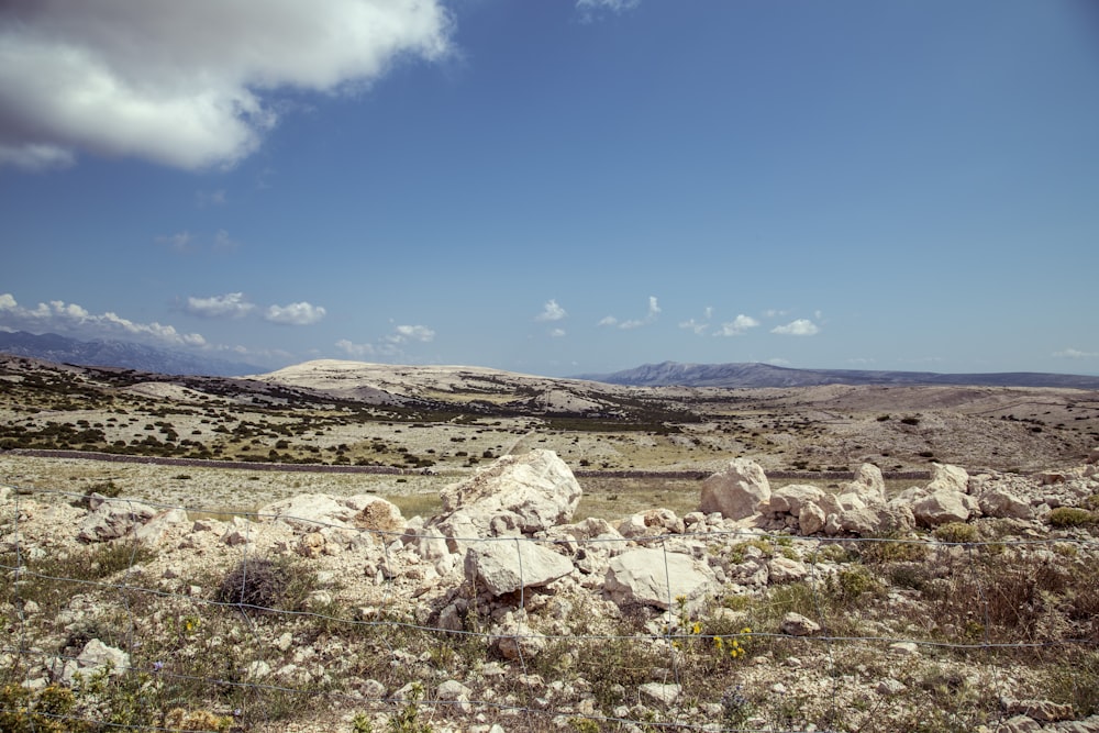 brown and gray rocks under blue sky during daytime