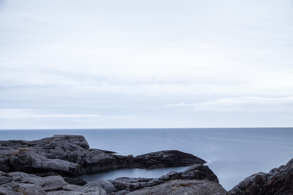 body of water near shore during daytime