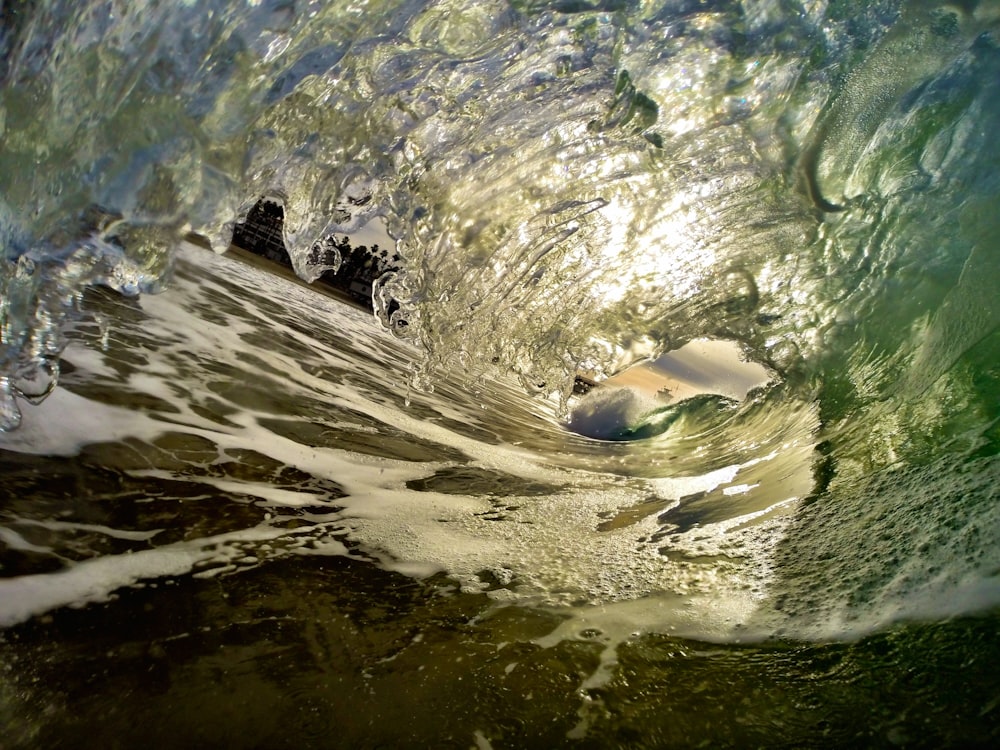 A small wave coming to the shore.