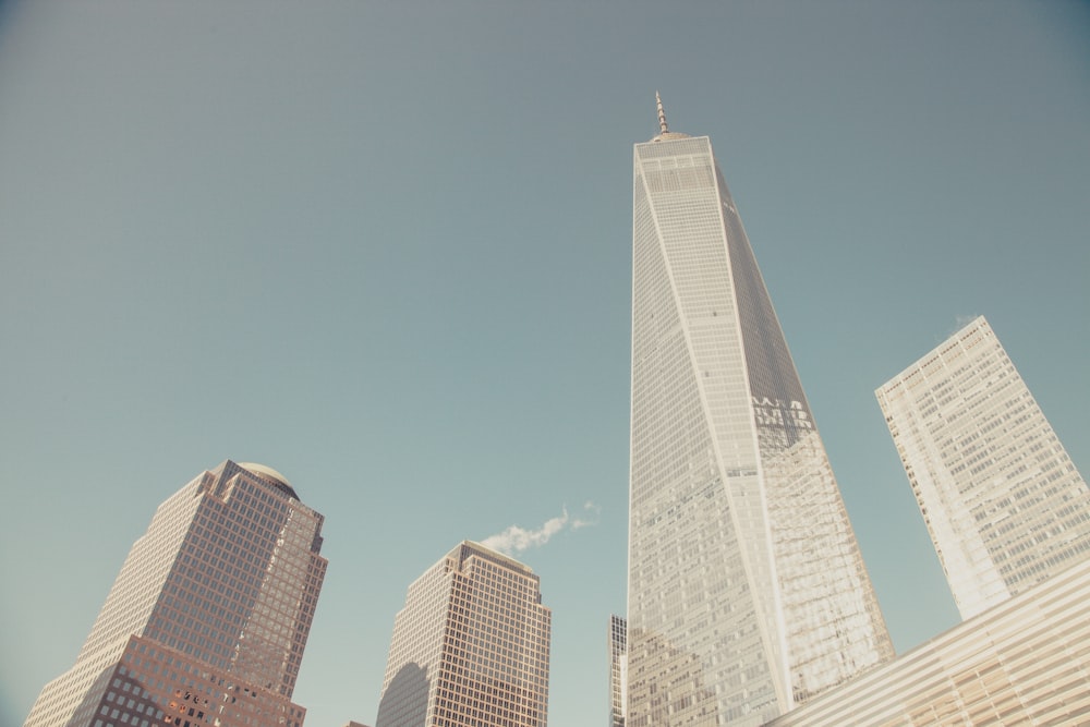 low angle photography of high rise buildings