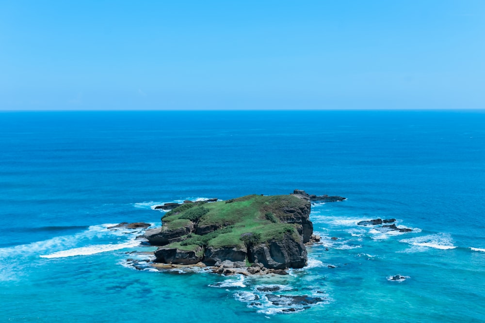 green island in the middle of ocean