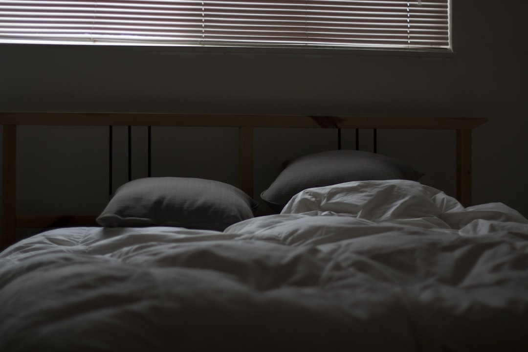 empty white and gray bed set, Messy bed and closed blinds