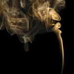 yellow smoke in black background