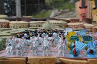 A colorful display of artwork created during the workshops, reflecting African creativity.