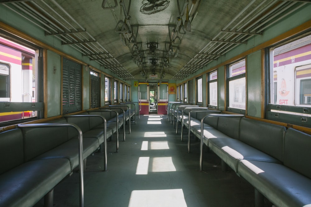 structural photography of green train coach