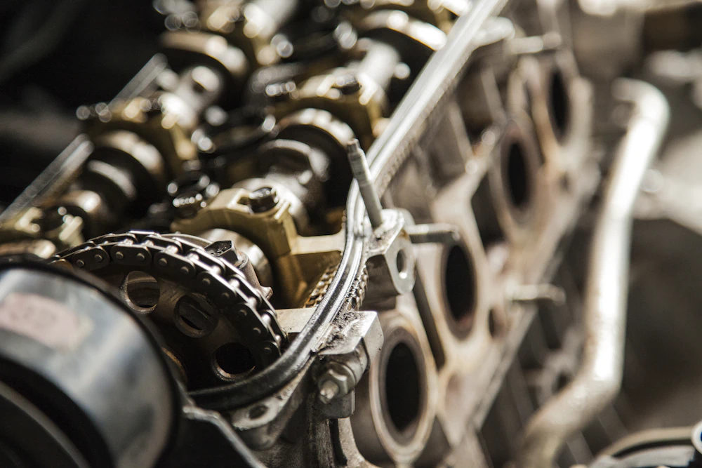 Close-up of engine camshafts inside a cylinder head