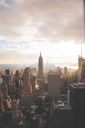 Empire State Building under cloudy sky
