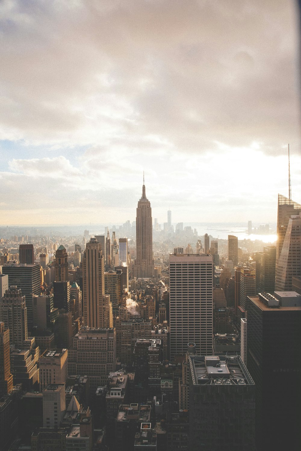 Empire State Building under cloudy sky