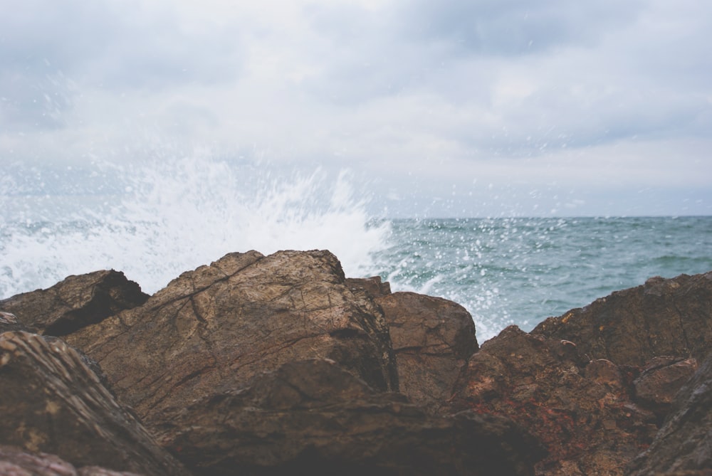 waves crashing on rocks