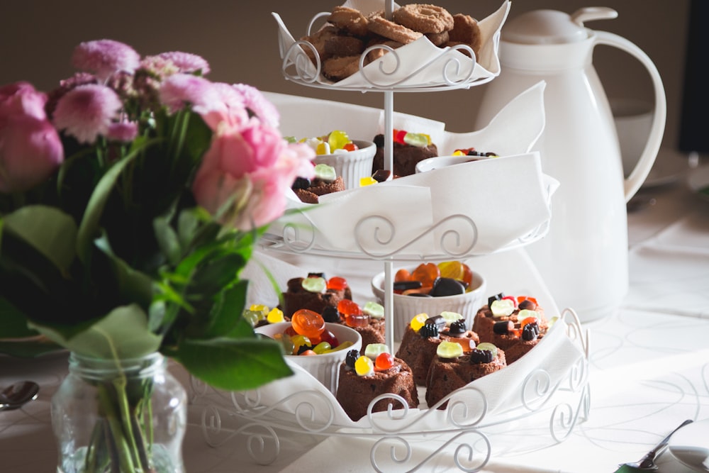 cupcakes on white metal cupcake stand