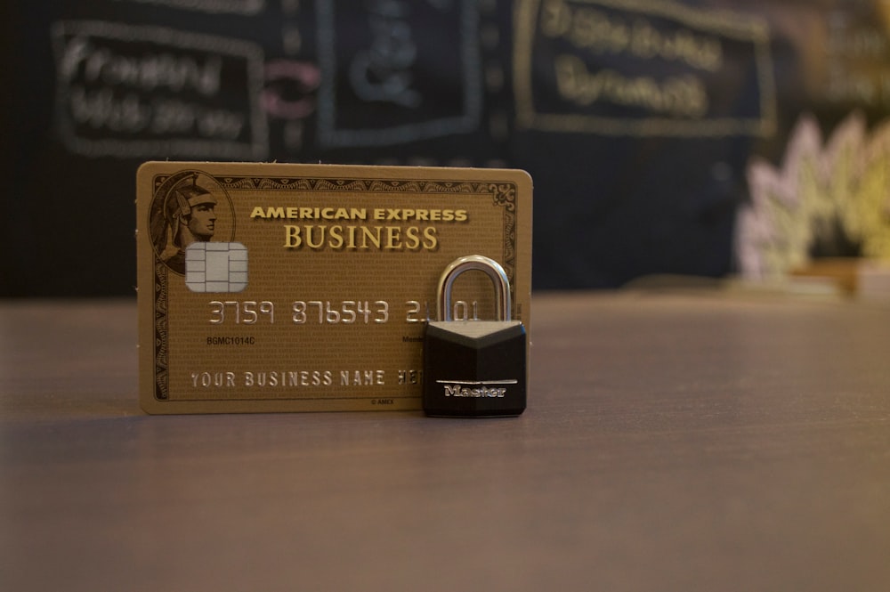 A lock in front of an American Express Business credit card.