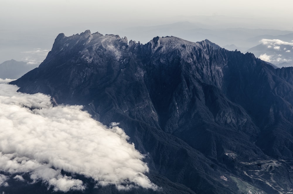 black and gray mountain with clouds