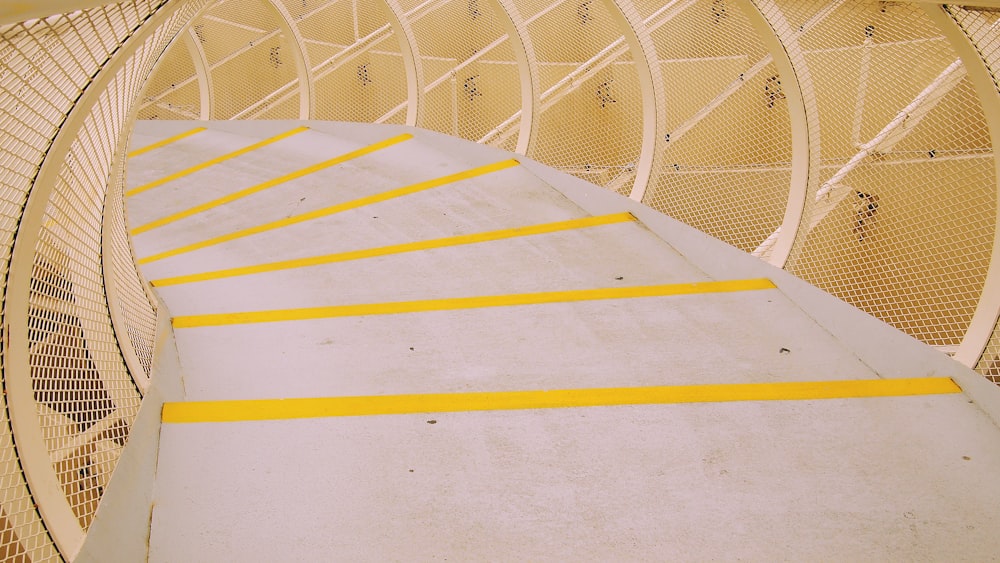 photo of white and yellow concrete stairs