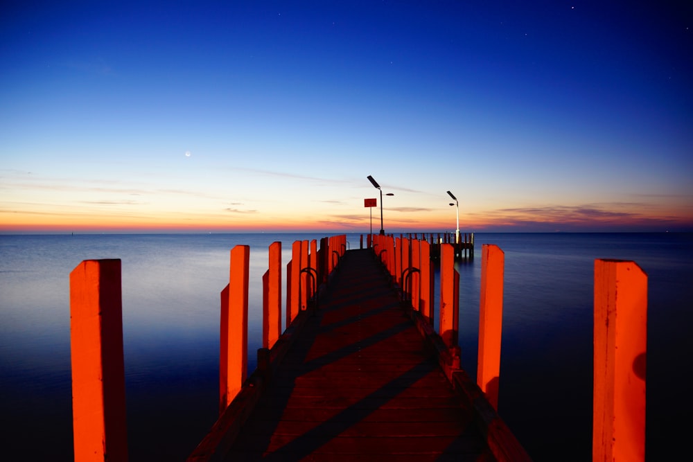 red dock under clear blue sky