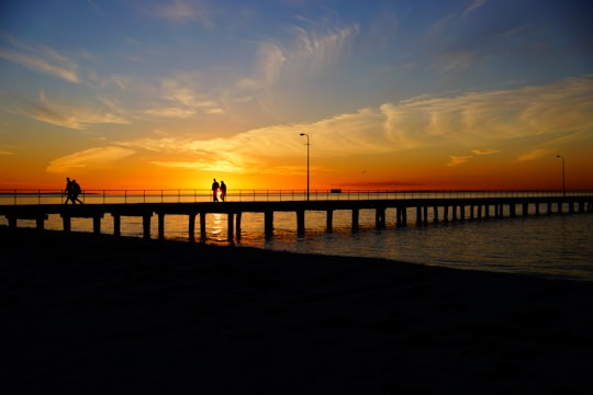 silhouette of people walking on bridge in Bay Trail Australia