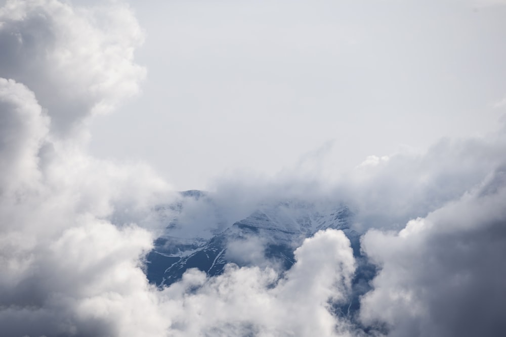 mountain coated white clouds