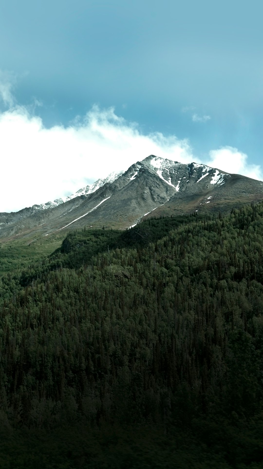 snowy mountain under blue sky