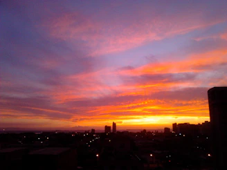 A vibrant still from a recent Vistapulse video featuring a colorful cityscape at sunset