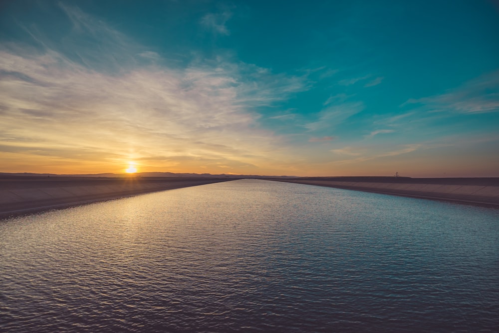 photo of canal during golden hour