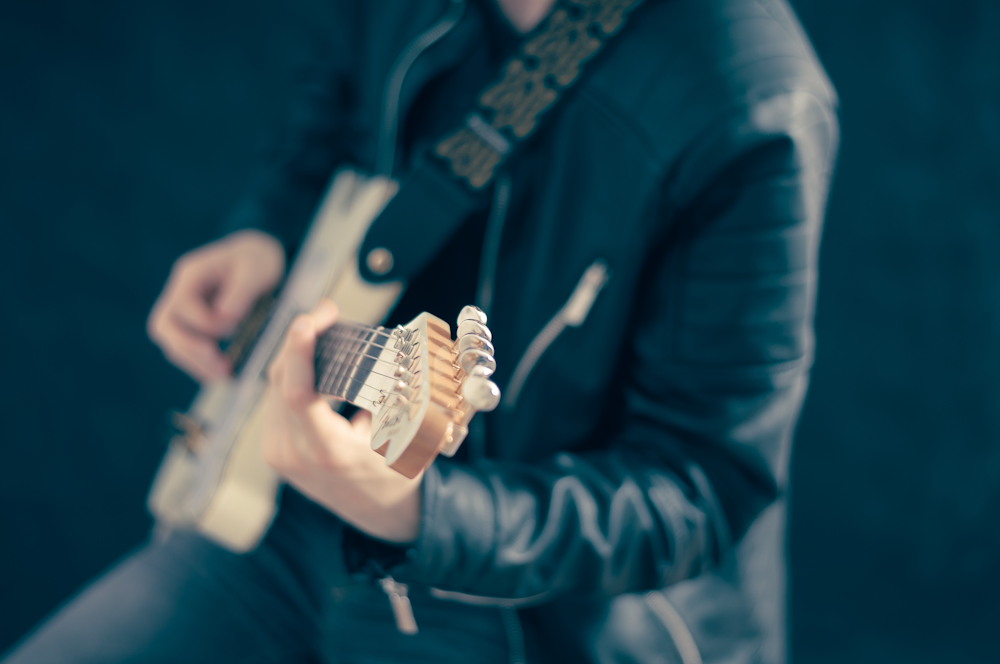 man playing guitar