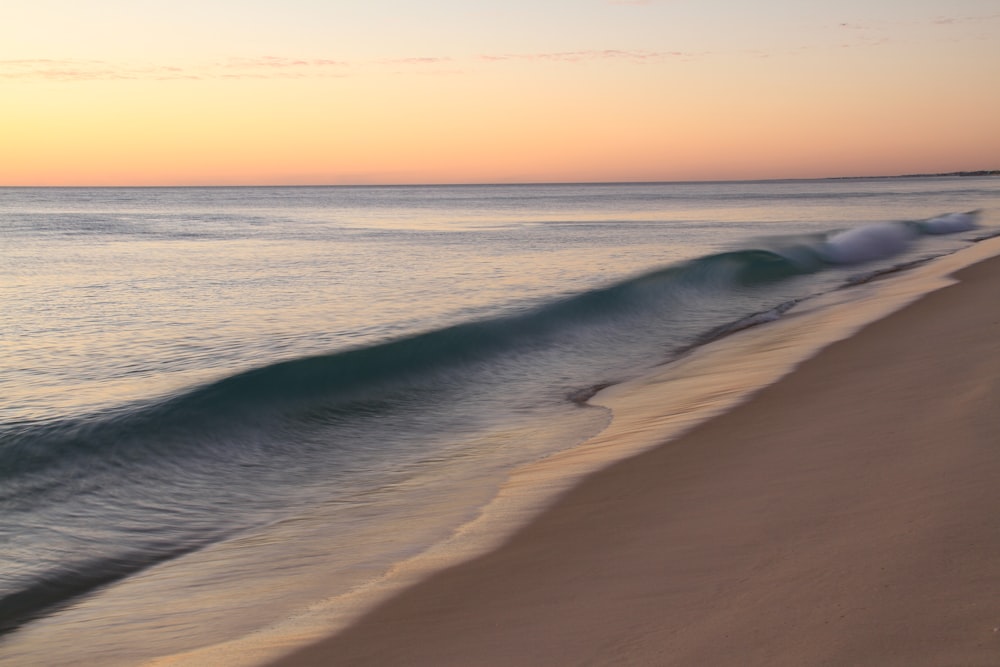 body of water during golden hour