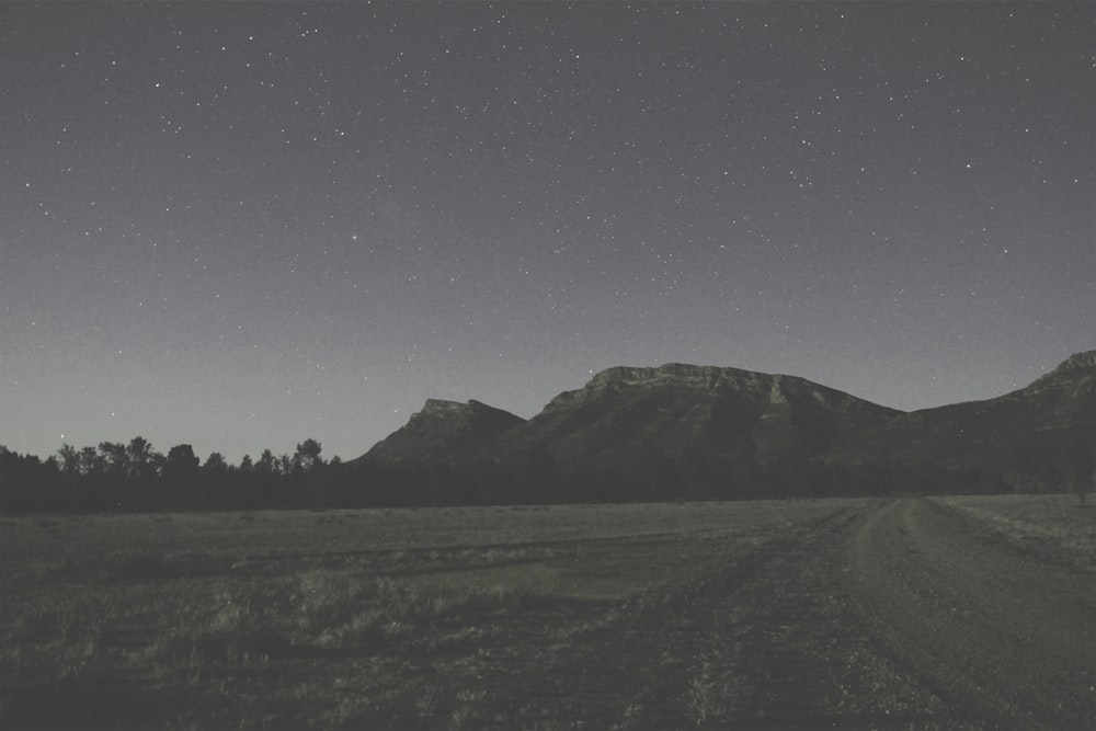 overlooking mountain during starry night