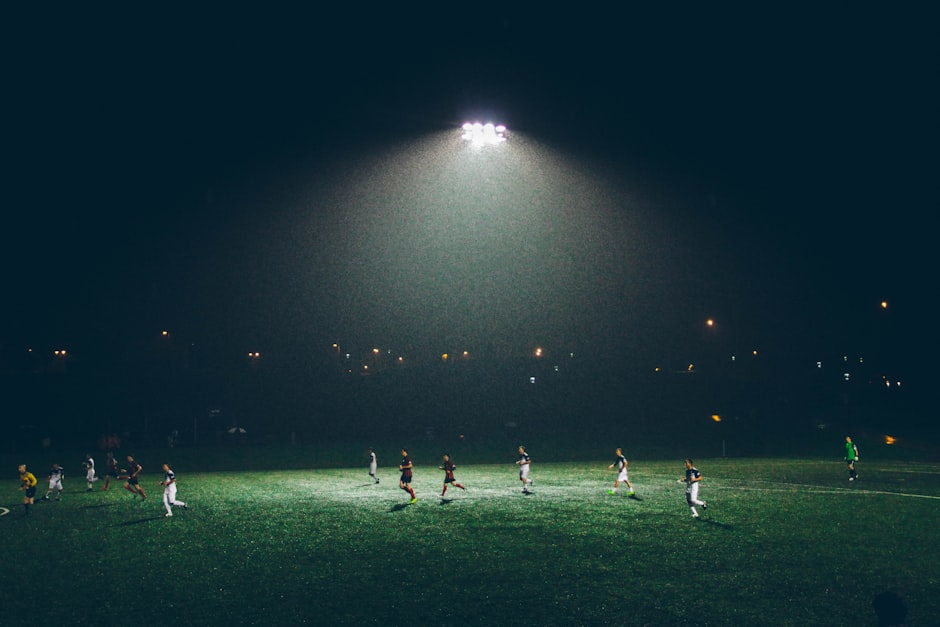 Football match under floodlights