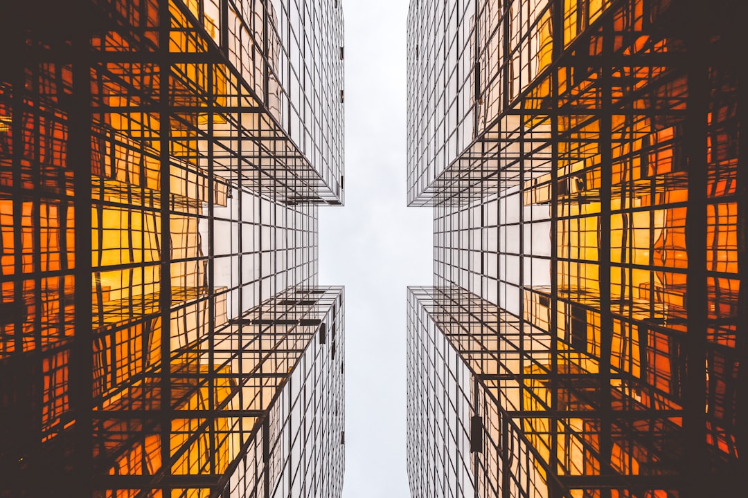 worms eye view of buildings, Orange reflective architecture