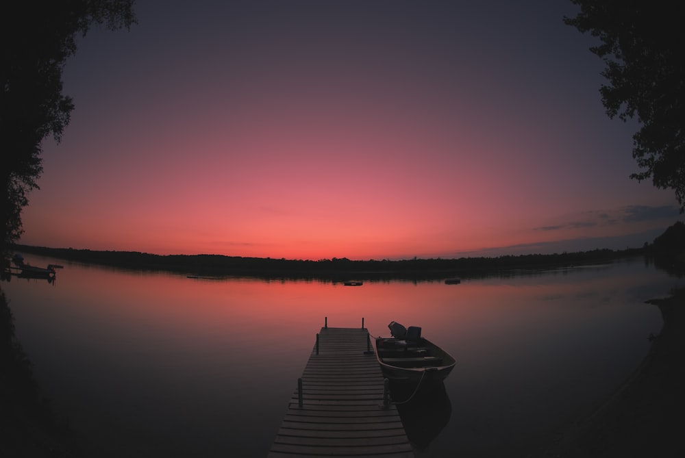 canoe on dock at night