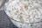 A close-up of a bowl filled with pristine white makhana, highlighting its natural texture.