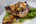 grilled steak with vegetables on white ceramic plate