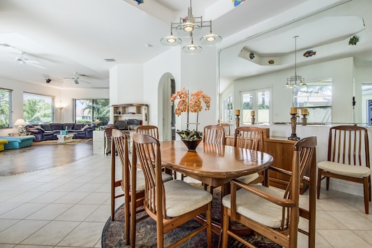 Open-plan kitchen and dining area with natural light and neutral tones.