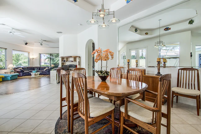 An inviting interior shot of a bright, open-plan living area with modern finishes and natural light pouring in.