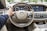person sitting in Mercedes-Benz driver seat