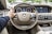 person sitting in Mercedes-Benz driver seat