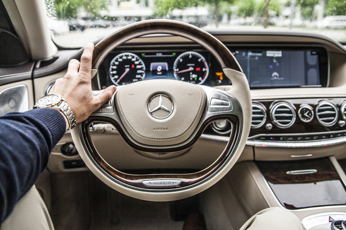 Mercedes tan Car Interior steering wheel and dashboard