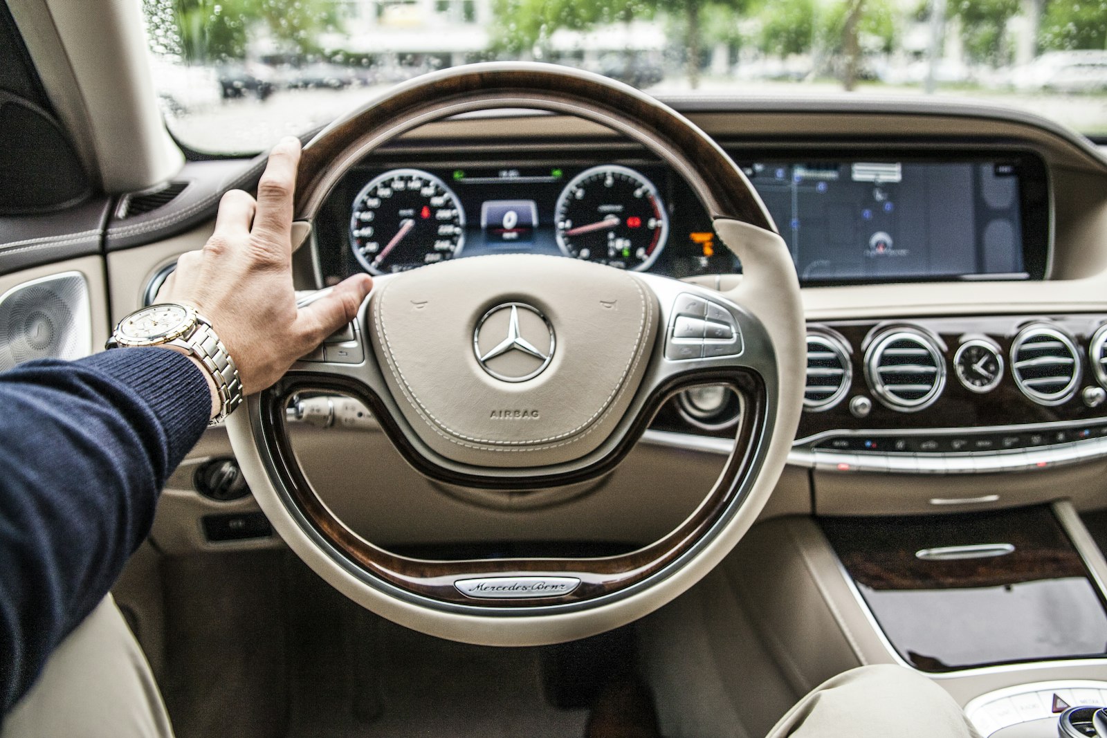 Sigma 24-70mm F2.8 EX DG Macro sample photo. Person sitting in mercedes-benz photography