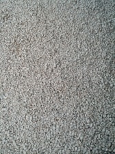 Fine crushed stone powder spread evenly on a construction site.