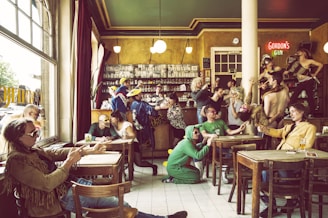 A lively cantina filled with various creatures interacting in their custom environments.