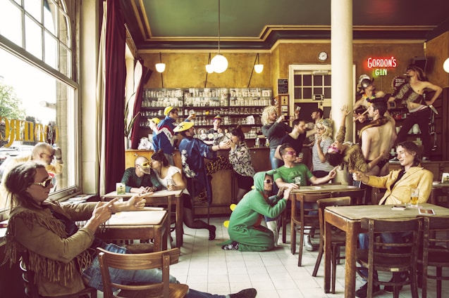 A lively cantina filled with various creatures interacting in their custom environments.