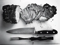 Artistic photo of a butcher slicing Wagyu beef with precision and care.
