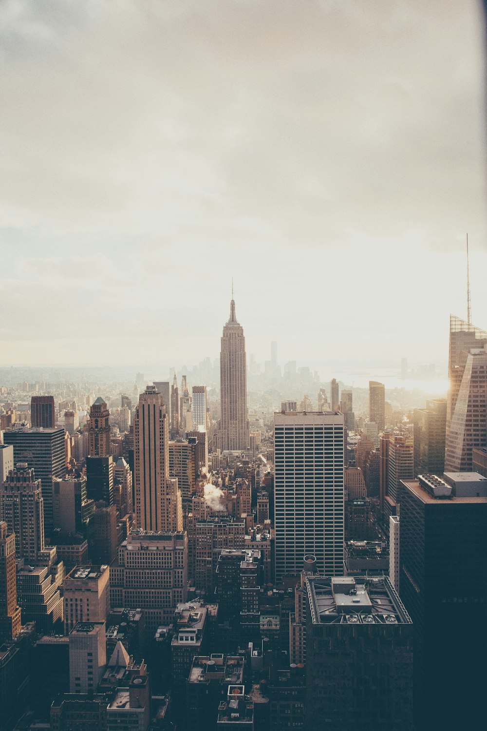 Empire State Building under white sky