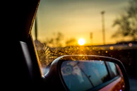 Sunset glow reflecting off a cool white interior window treated with premium solar defense film.