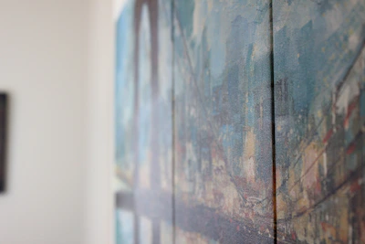 Close-up of a colorful impressionist wedding painting in progress.