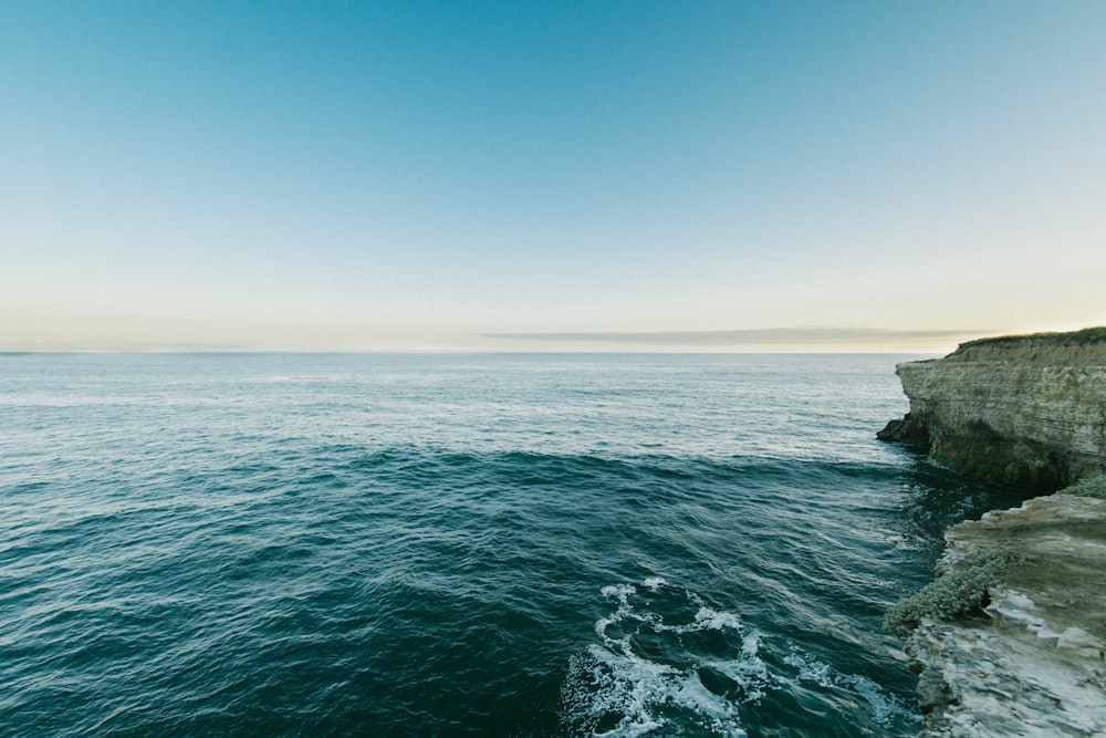 blue sea under blue sky