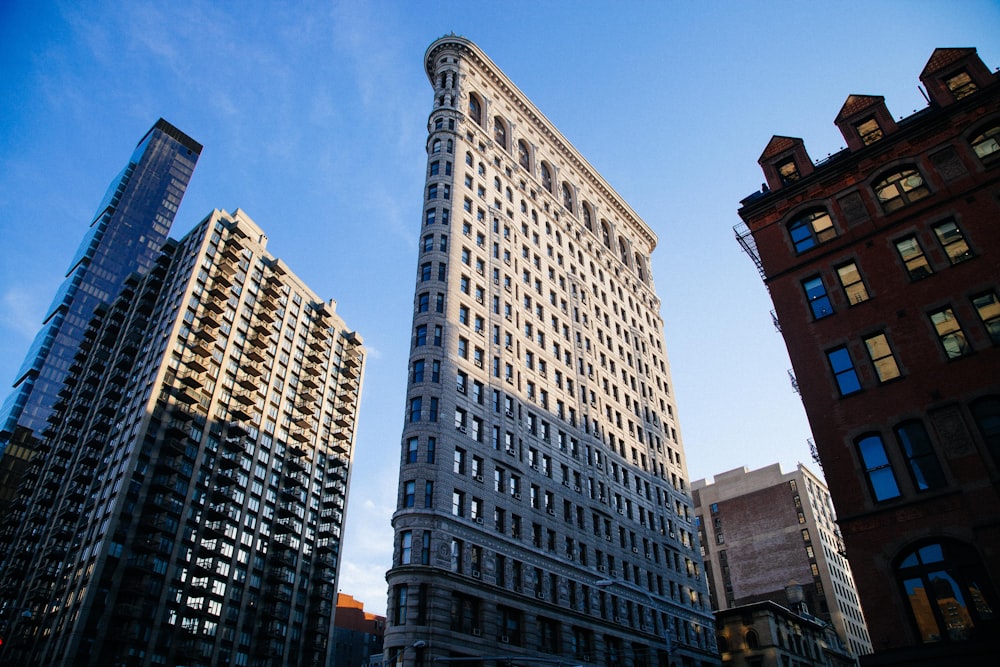 brown and white high-rise buildings under blue sky