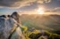 Sunrise above the mountains with glowing clouds, symbolizing a new beginning and gentle self-healing