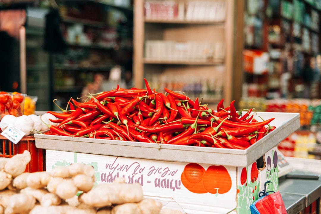 red chili pile on gray steel tray, Box of Chilis